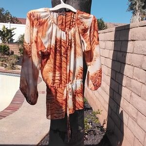 This Madison Paige Blouse With Animal Print And A Top Under Size L